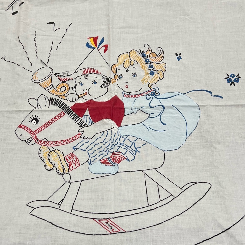 Vintage embroidered child’s sheet